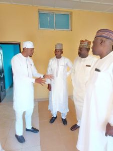 The new DG. of Niger State Housing Corporation Bashir Yakubu Harka in a group conversation 