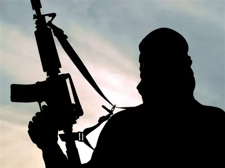 GUNMEN  KILL  PASTOR AND 3 OTHERS